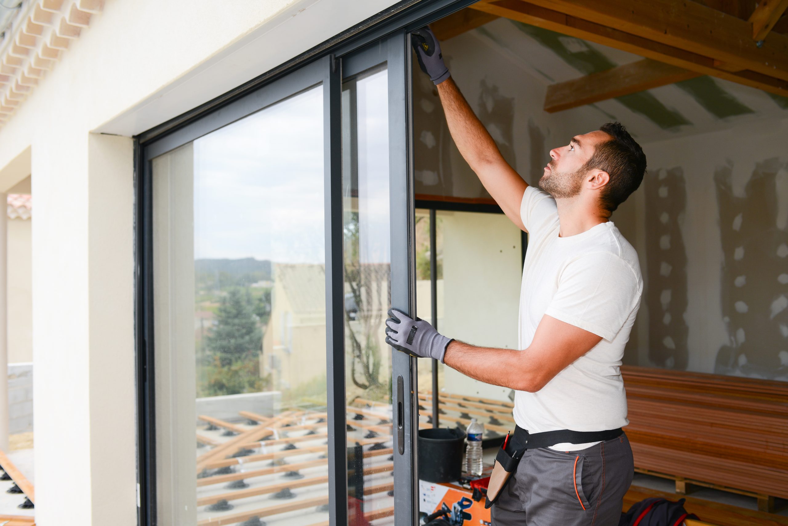 man checking aluminium door